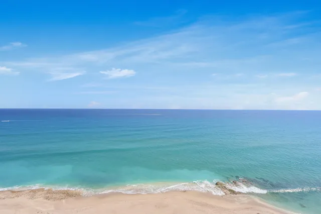 a view of a livingroom with furniture and window