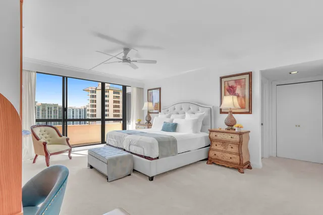 a bathroom with a sink vanity mirror and toilet