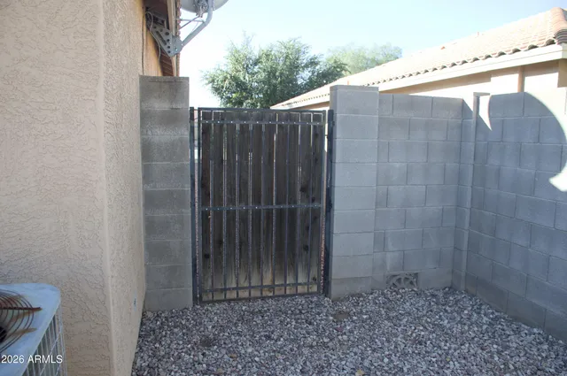a view of a wooden fence