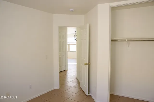a view of a bathroom with a sink and a mirror