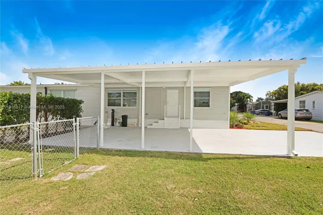 a view of an house with a swimming pool