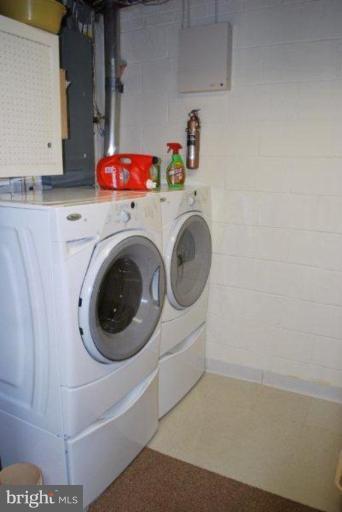 13233 Clifton Road Silver Spring, MD 20904 - Photo 25 of 30 a utility room with dryer and washer