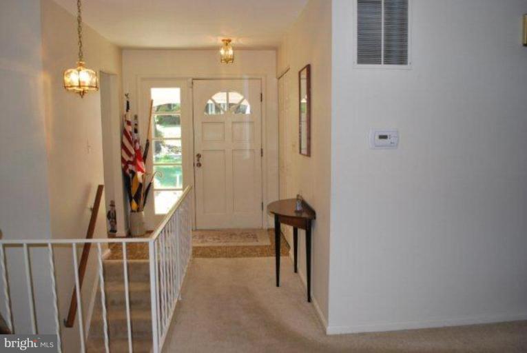 13233 Clifton Road Silver Spring, MD 20904 - Photo 5 of 30 a view of a hallway with a white walls