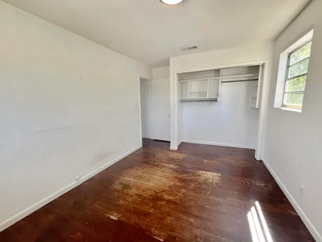 an empty room with windows