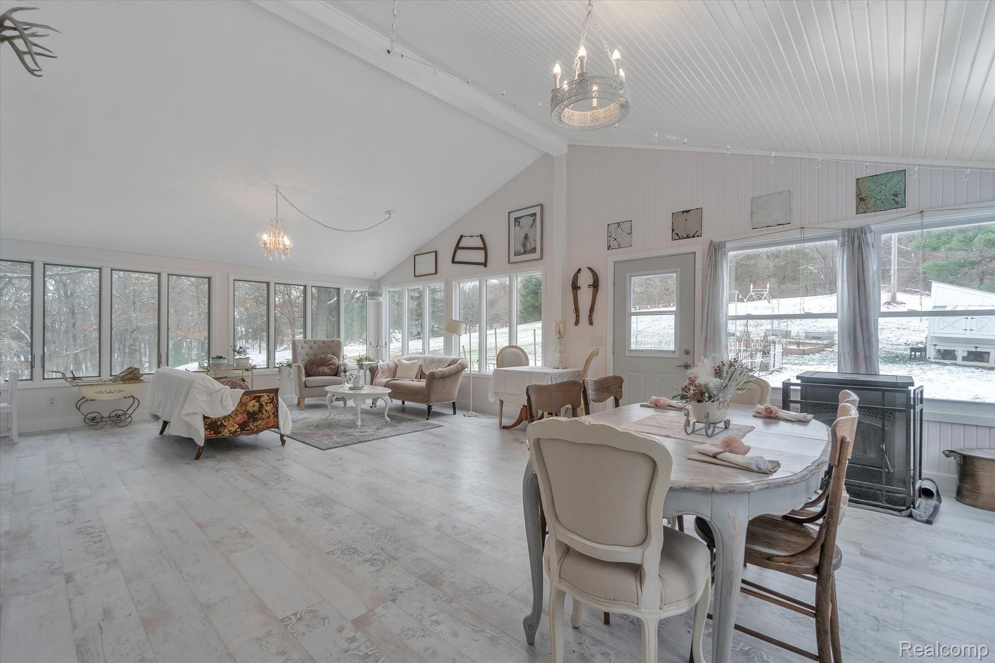 3000 Sanitorium Road Howell, MI 48843 - Photo 13 of 40 Grand 4 Season Room Is Perfect For Entertaining With Wood Peak Ceilings And Lots Of Natural Light