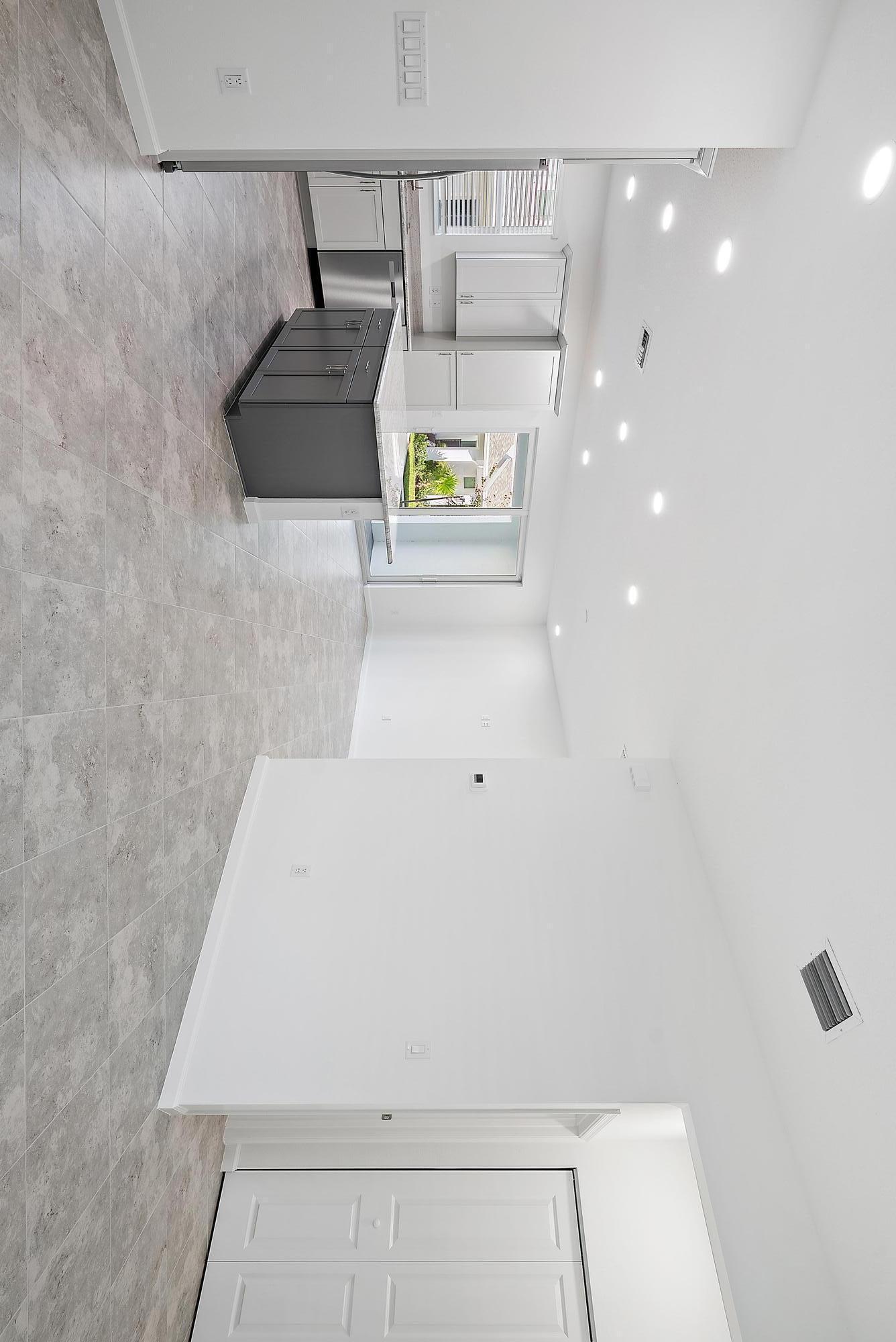 16377 Biltmore Landing Loxahatchee, FL 33470 - Photo 3 of 23 a bathroom with a bathtub