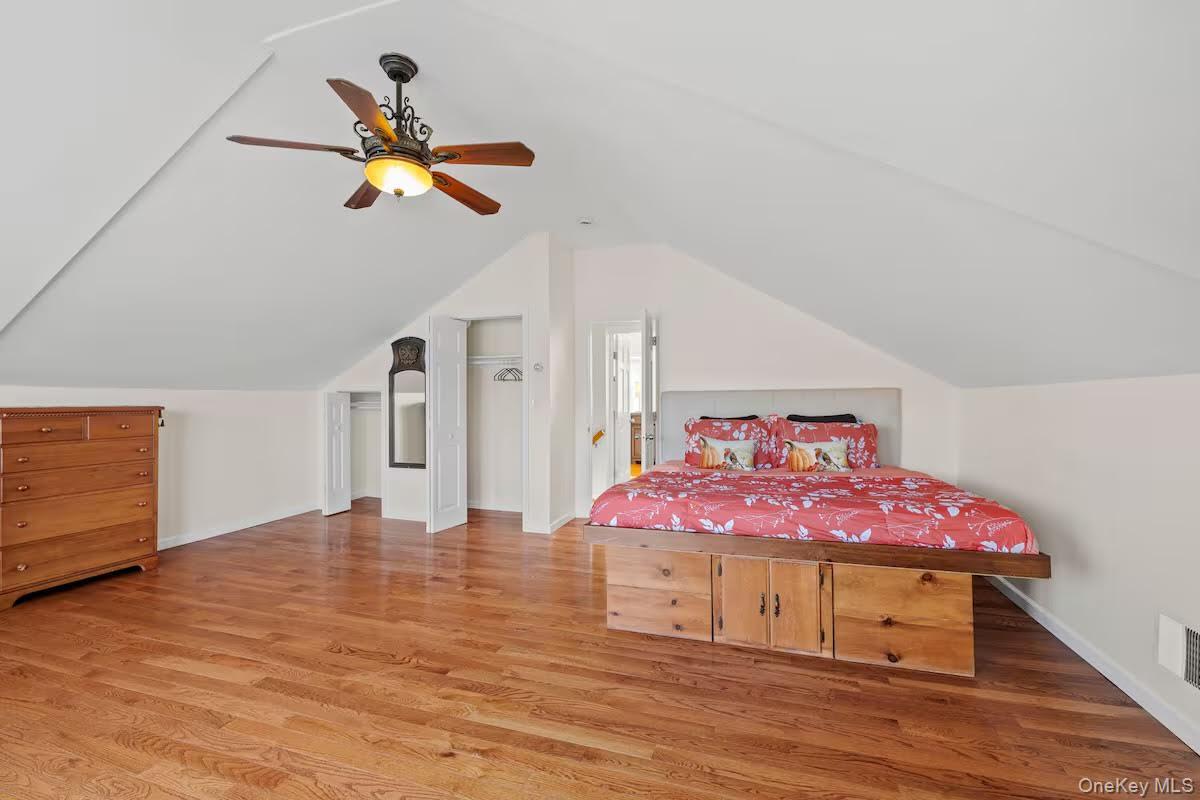 31 Wayne Avenue Verplanck, NY 10596 - Photo 11 of 25 a view of a livingroom with wooden floor and a ceiling fan