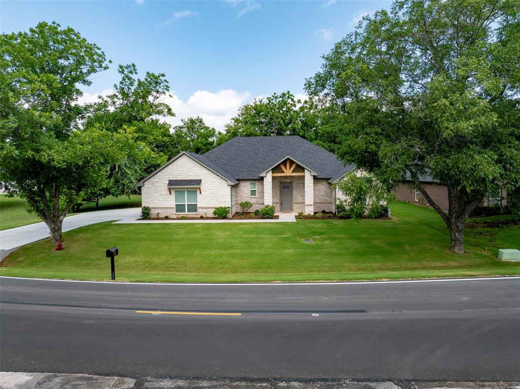 10301 Ravenswood Road Granbury, TX 76049 - Photo 5 of 38 Well maintained front yard.