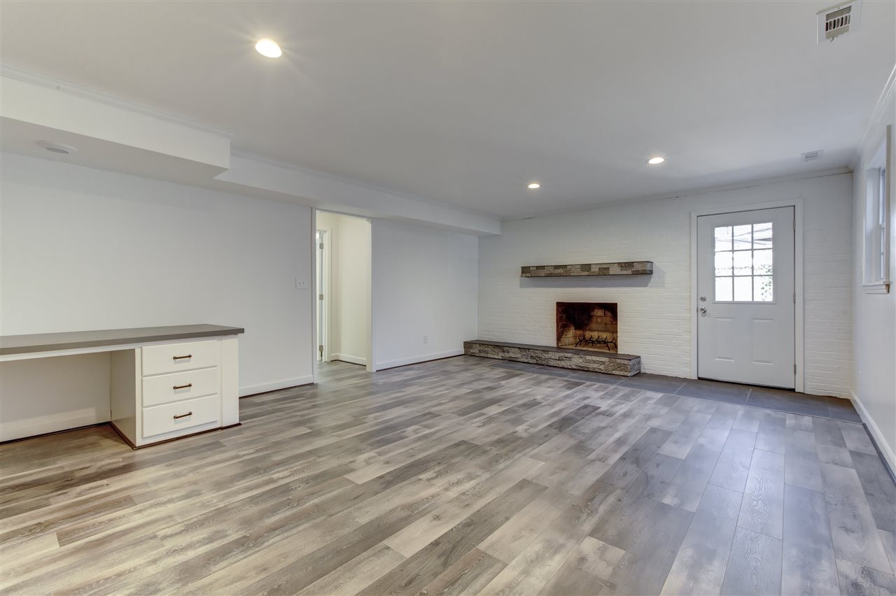 5205 Fieldstone Drive Raleigh, NC 27609 - Photo 10 of 13 This is a large multi-purpose room in the basement. Family Room