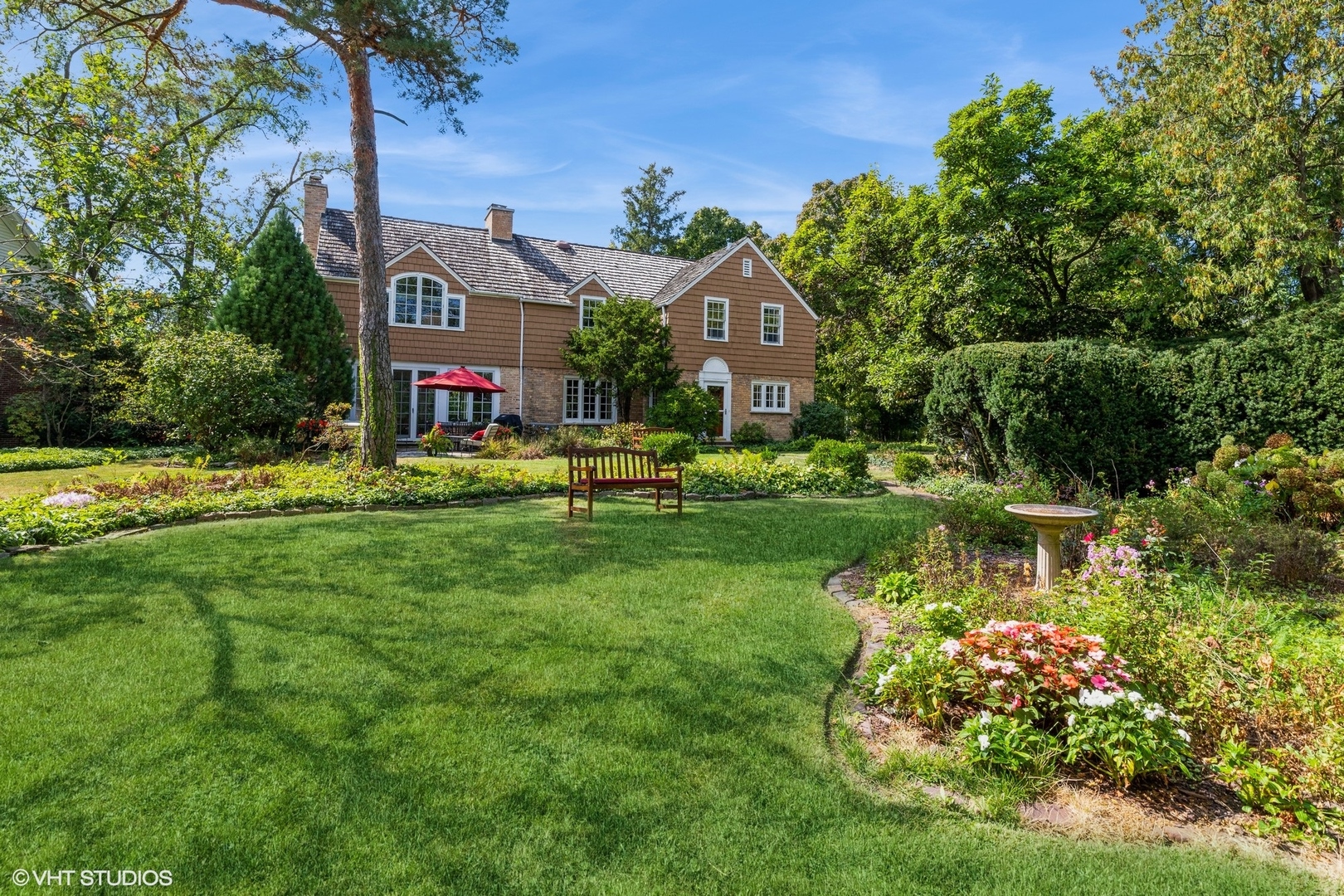 753 York Road Glenview, IL 60025 - Photo 16 of 17 a front view of a house with garden
