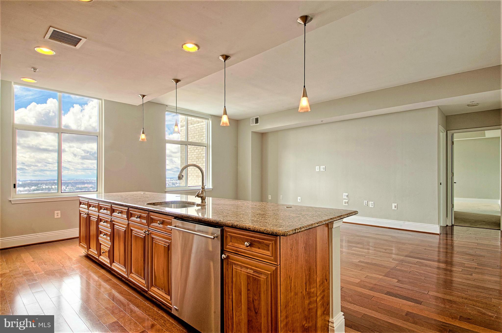 11990 Market Street, Unit 1913 Reston, VA 20190 - Photo 12 of 30 Kitchen open to Family Room