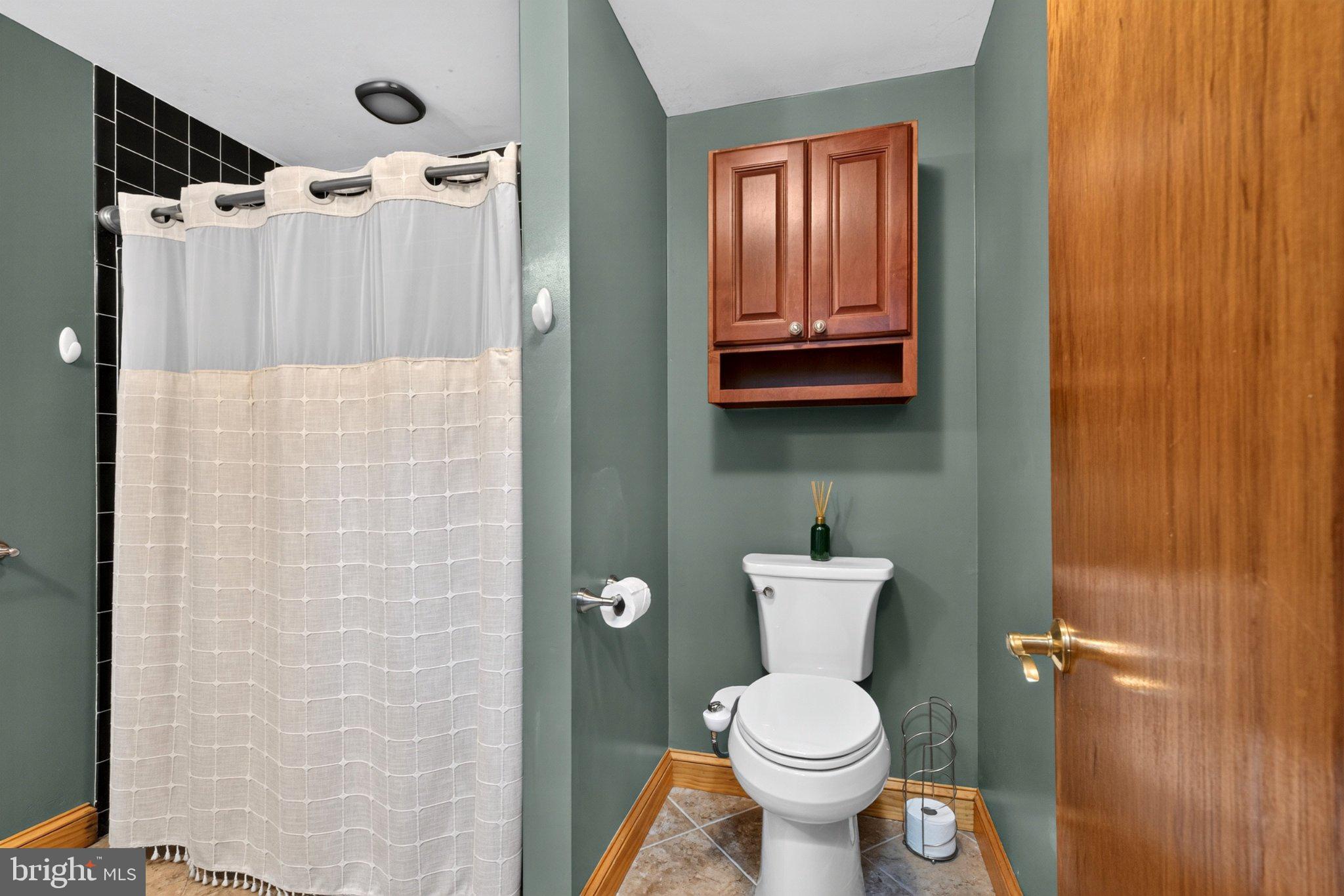 2858 Lodge Farm Road Baltimore, MD 21219 - Photo 17 of 49 Chic bathroom with modern accents.