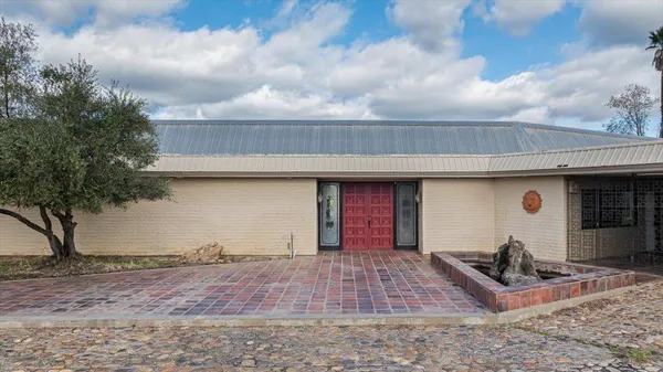a kitchen with stainless steel appliances cabinets and a counter top space