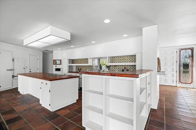 a bathroom with a sink and a large mirror