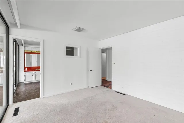 a view of a backyard of the house