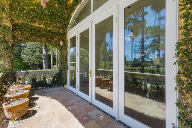 a kitchen with stainless steel appliances a sink stove and cabinets