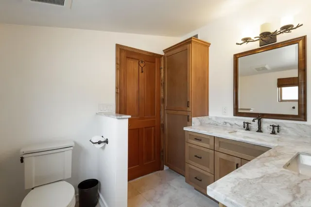 a view of balcony with wooden floor