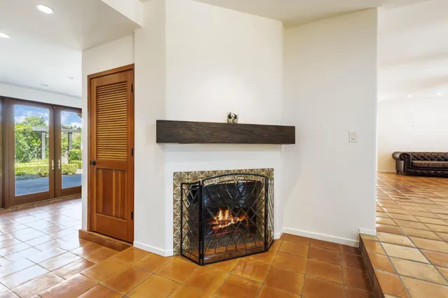 a kitchen with granite countertop a stove and a sink