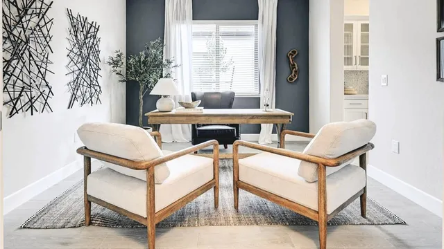 a kitchen with stainless steel appliances white cabinets and a sink