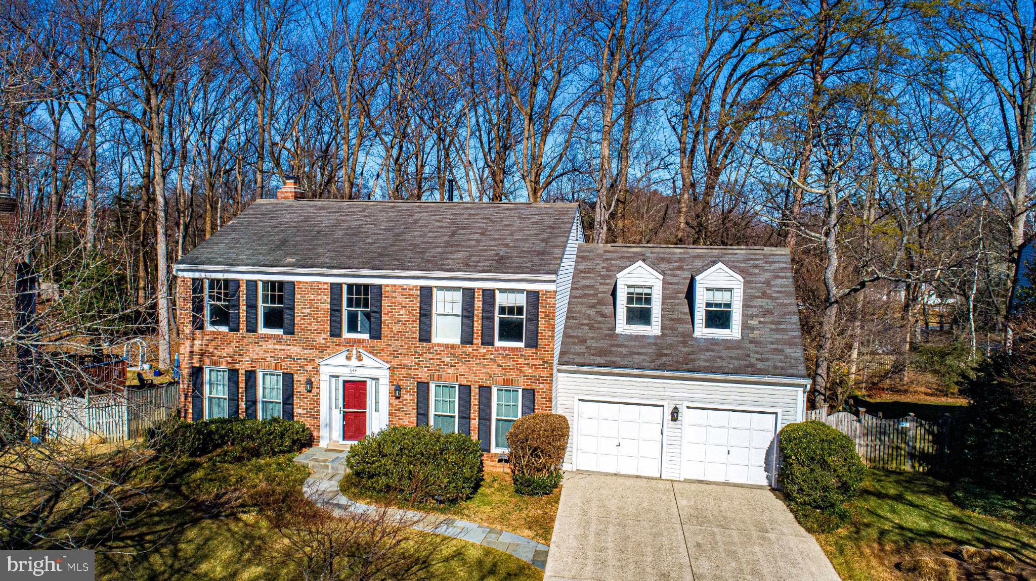 644 Symphony Woods Drive Silver Spring, MD 20901 - Photo 2 of 53 a front view of a house with garden