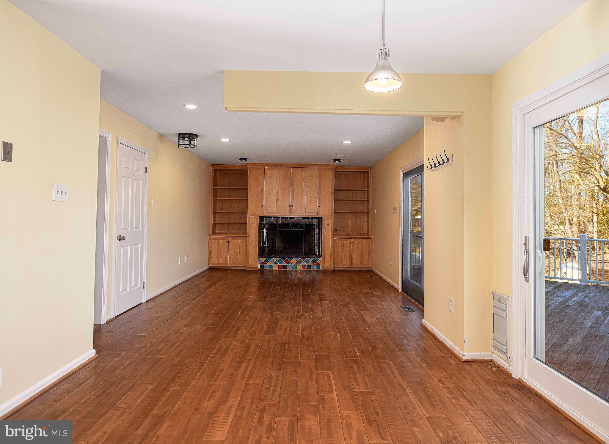 644 Symphony Woods Drive Silver Spring, MD 20901 - Photo 26 of 53 a view of livingroom with furniture wooden floor and window