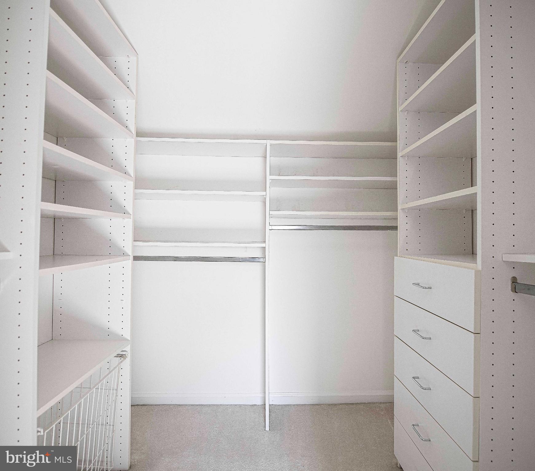 644 Symphony Woods Drive Silver Spring, MD 20901 - Photo 36 of 53 a view of an empty walk in closet
