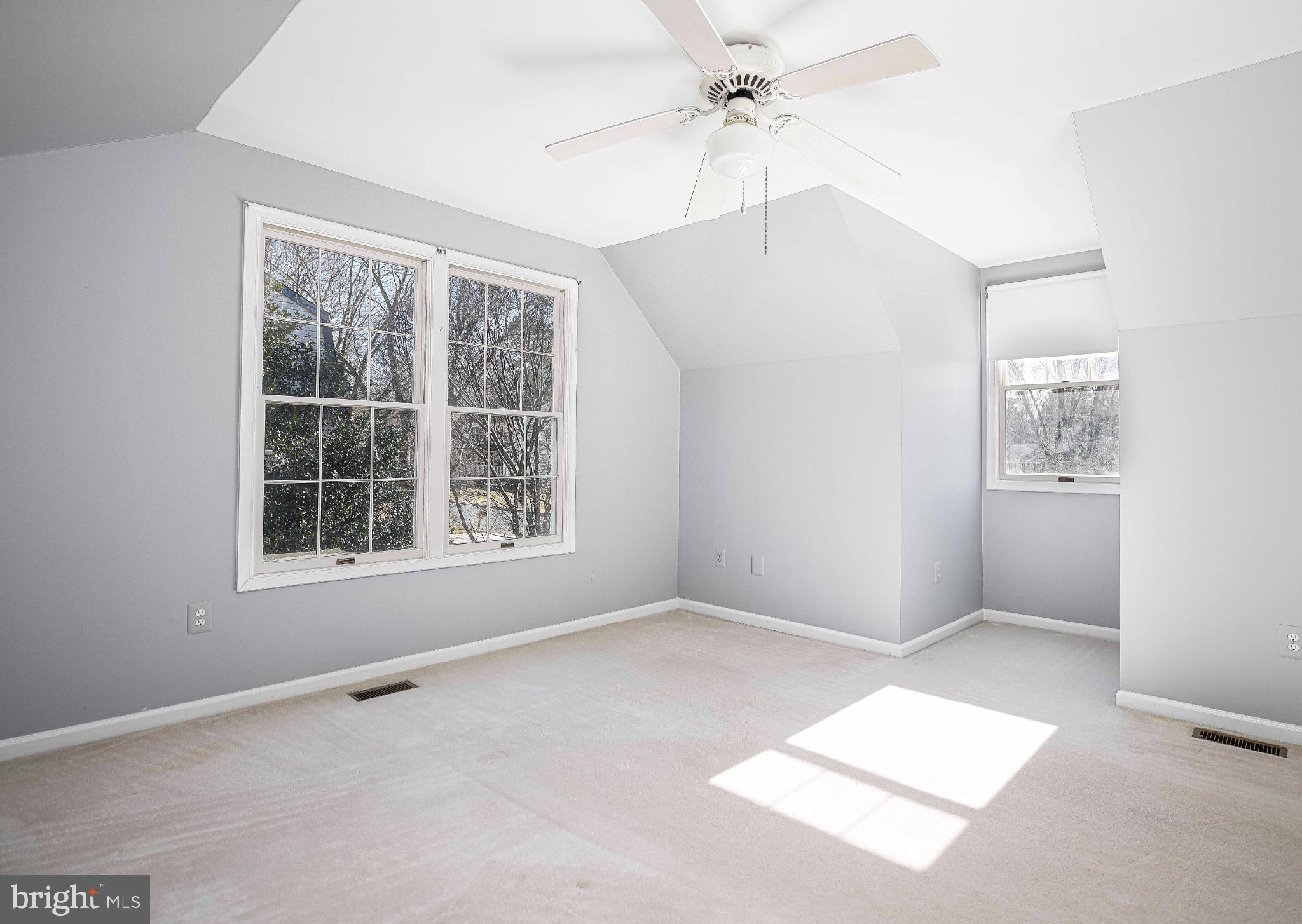 644 Symphony Woods Drive Silver Spring, MD 20901 - Photo 40 of 53 an empty room with windows and fan