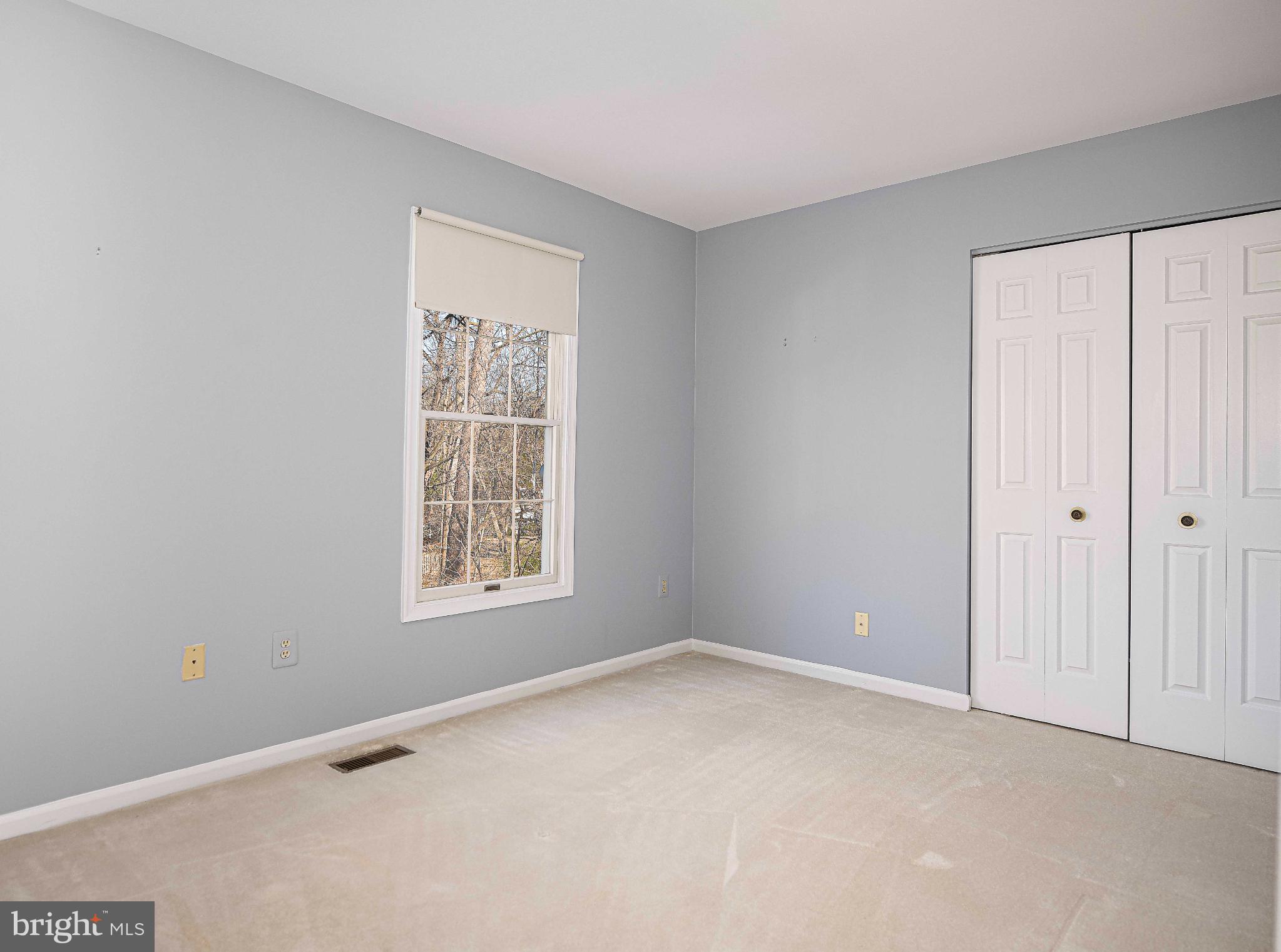 644 Symphony Woods Drive Silver Spring, MD 20901 - Photo 41 of 53 a view of an empty room with a window