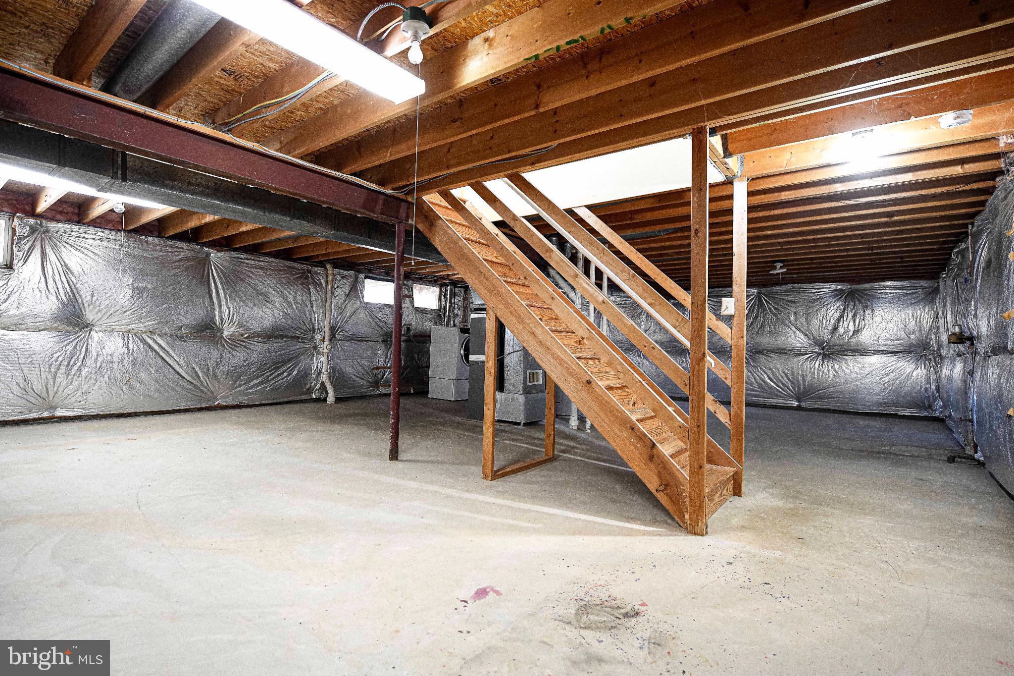 644 Symphony Woods Drive Silver Spring, MD 20901 - Photo 45 of 53 a view of an empty room with wooden floor