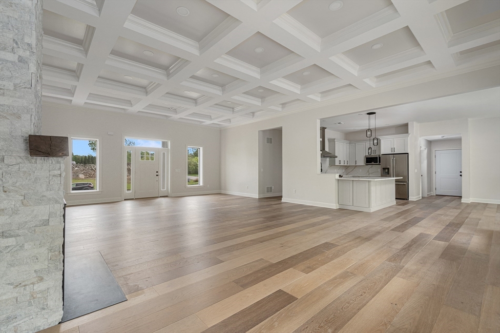 68 Richard Circle Seekonk, MA 02771 - Photo 14 of 40 a view of empty room with kitchen