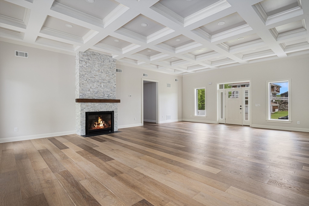 68 Richard Circle Seekonk, MA 02771 - Photo 16 of 40 an empty room with windows and fireplace