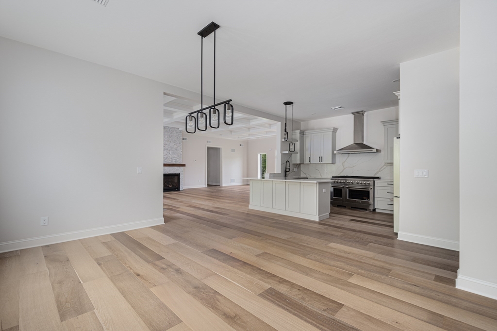 68 Richard Circle Seekonk, MA 02771 - Photo 19 of 40 a view of a kitchen with a oven cabinets and a ceiling fan