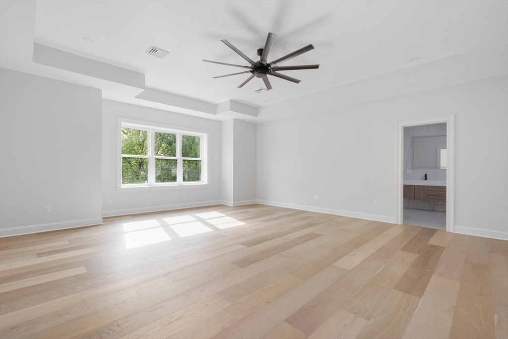 68 Richard Circle Seekonk, MA 02771 - Photo 24 of 40 an empty room with windows and fan