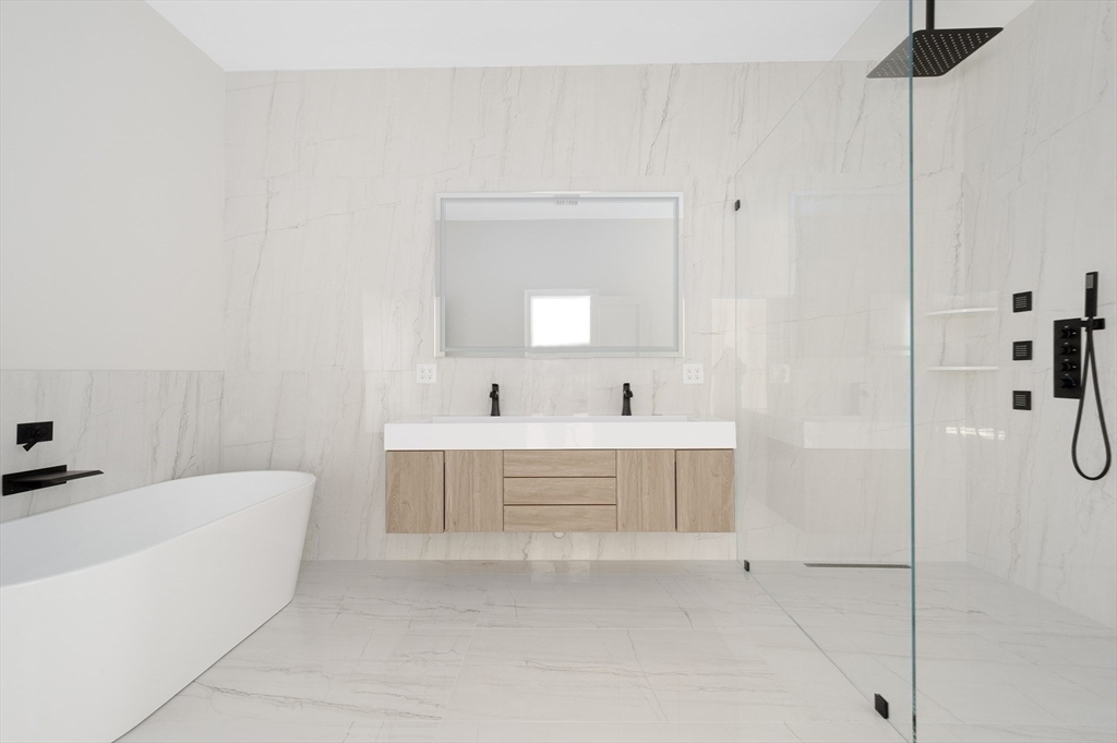 68 Richard Circle Seekonk, MA 02771 - Photo 26 of 40 a bathroom with a bathtub and a sink