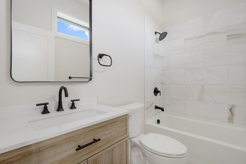 68 Richard Circle Seekonk, MA 02771 - Photo 35 of 40 a bathroom with a sink a toilet and shower