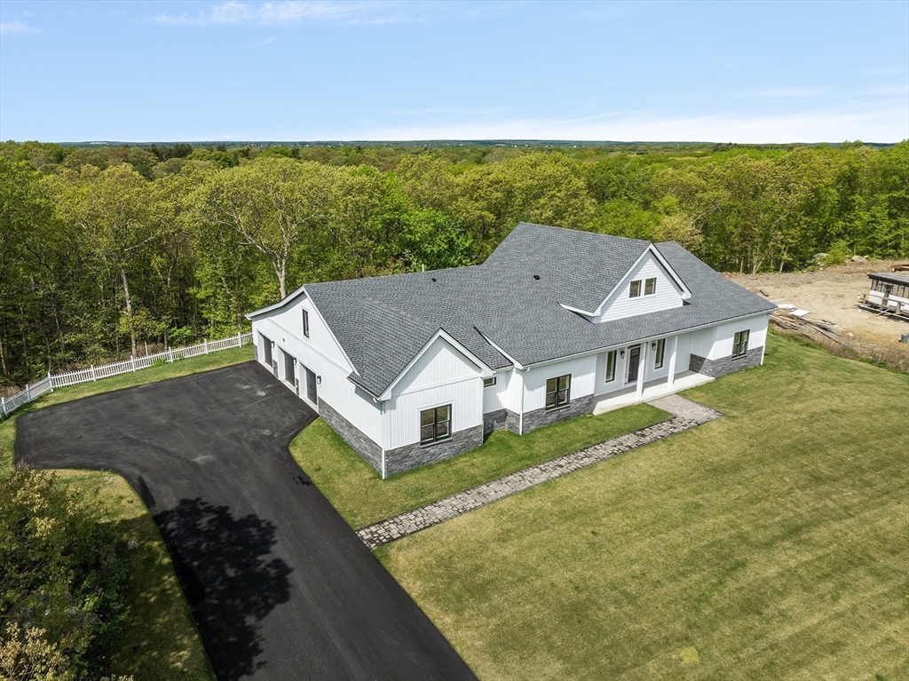 68 Richard Circle Seekonk, MA 02771 - Photo 7 of 40 a view of a house with a big yard potted plants and large tree