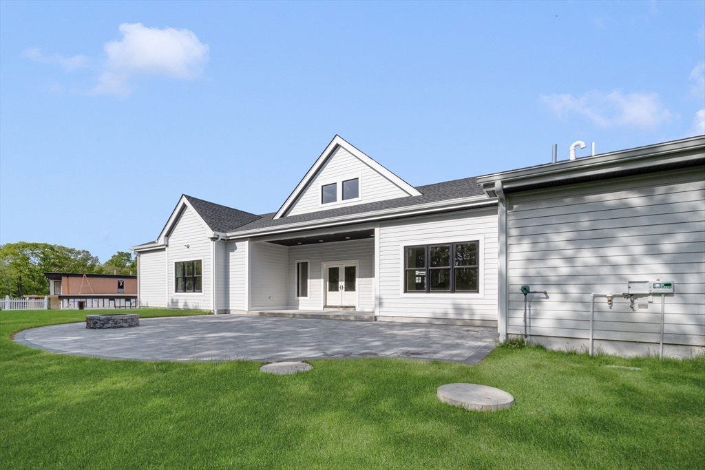 68 Richard Circle Seekonk, MA 02771 - Photo 9 of 40 a front view of a house with a yard