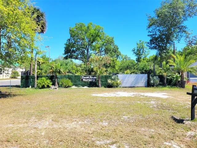 a view of a pool with a trees