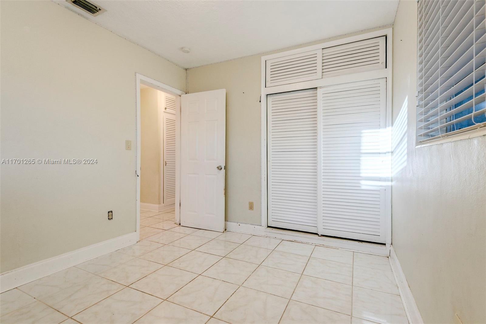 14281 Southwest 285th Street Homestead, FL 33033 - Photo 17 of 27 a view of an empty room