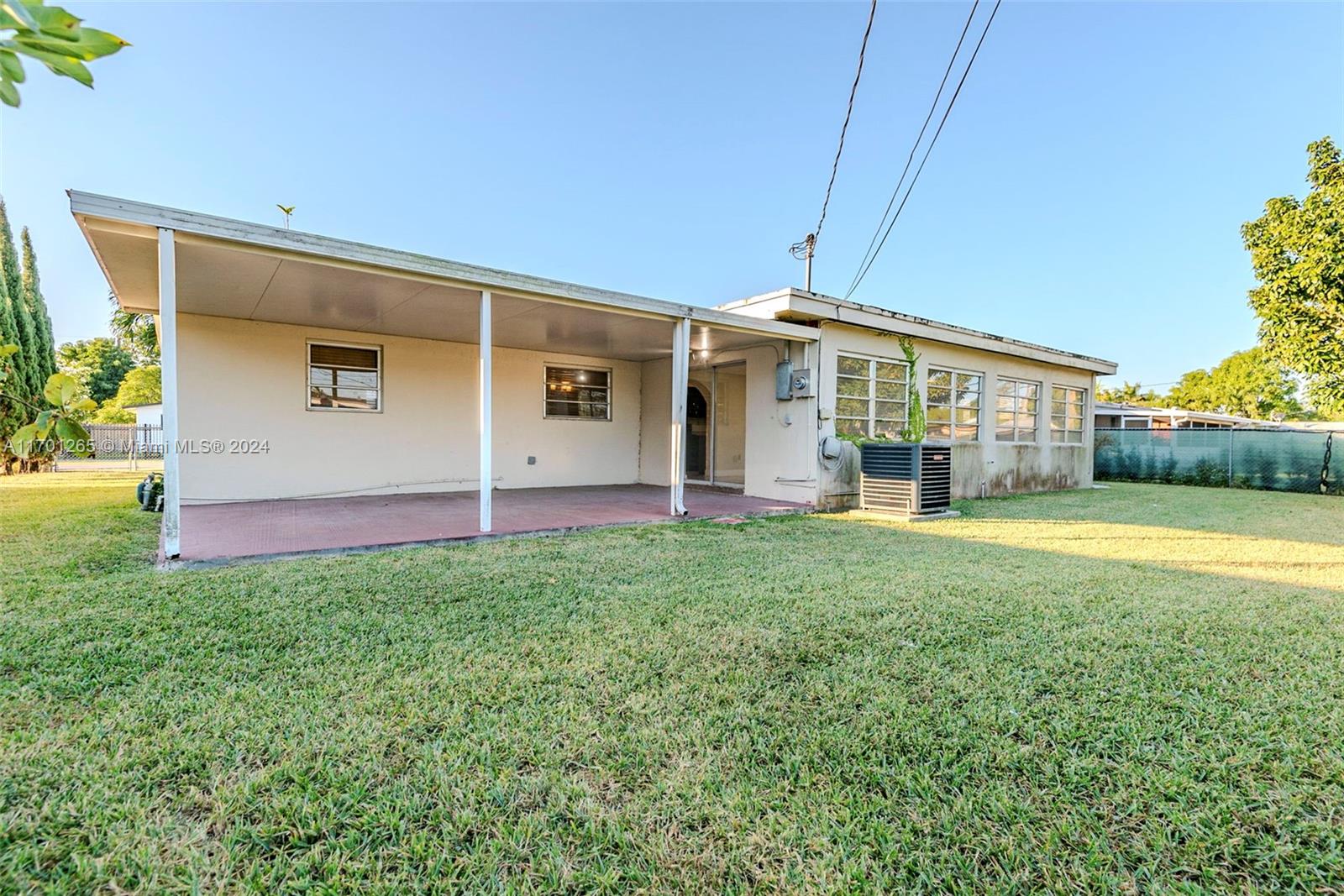 14281 Southwest 285th Street Homestead, FL 33033 - Photo 2 of 27 a view of a house with backyard and a garden