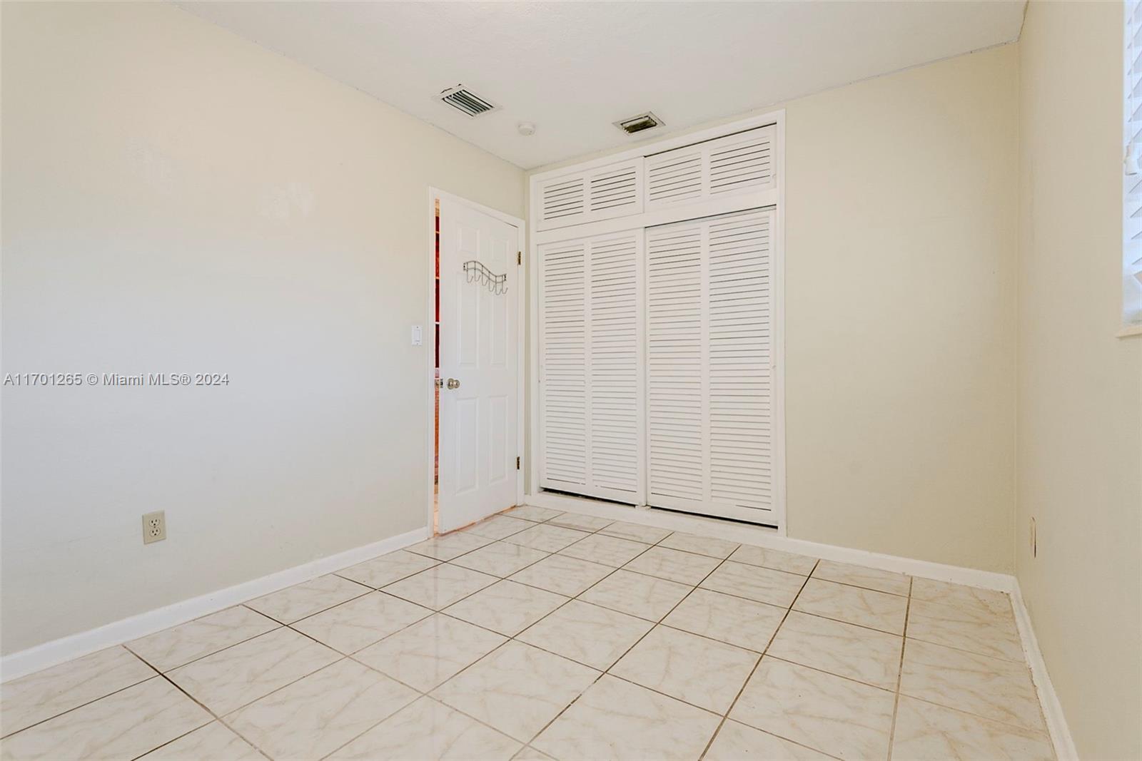 14281 Southwest 285th Street Homestead, FL 33033 - Photo 22 of 27 a view of an empty room
