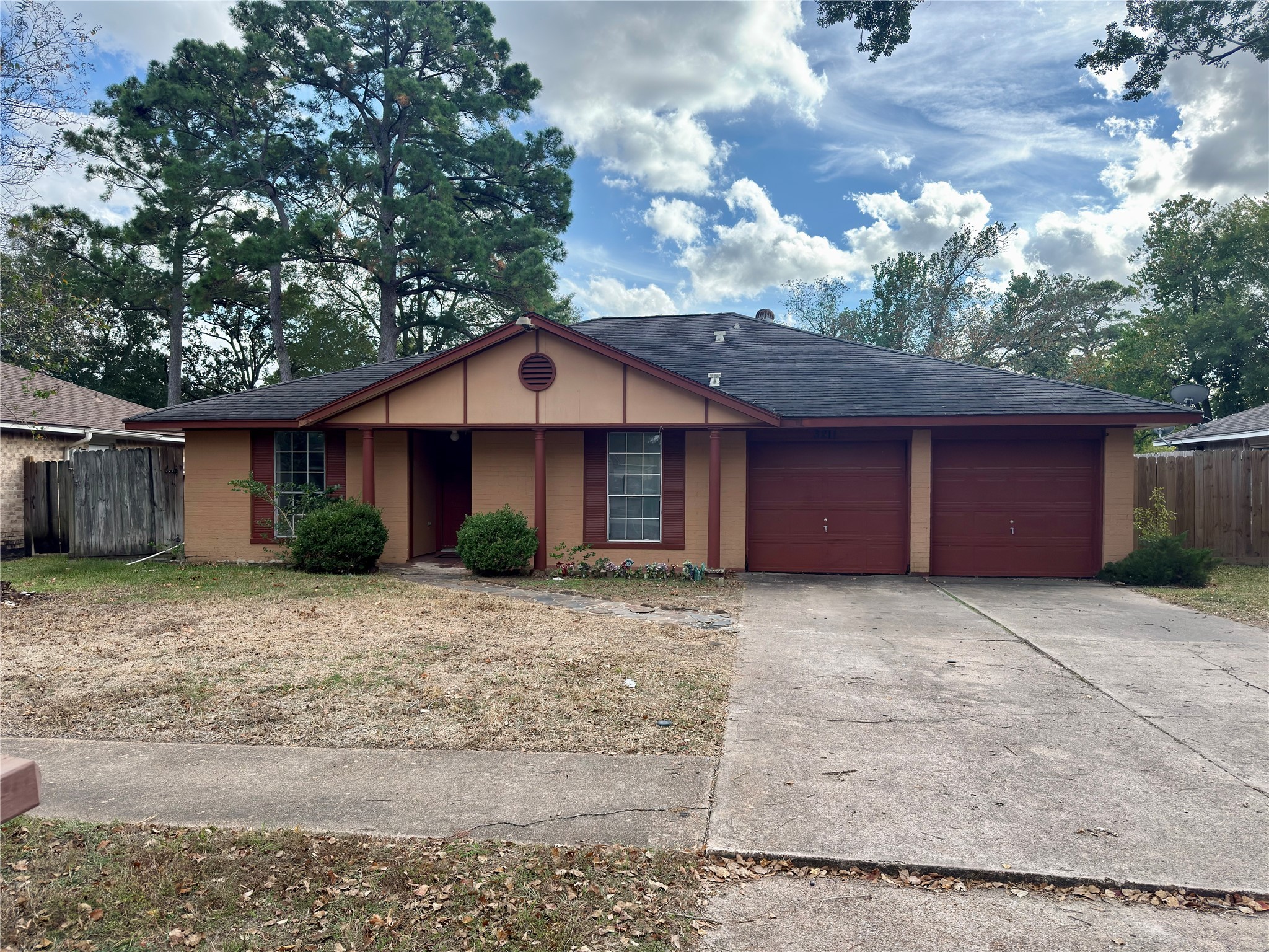 a front view of a house with yard