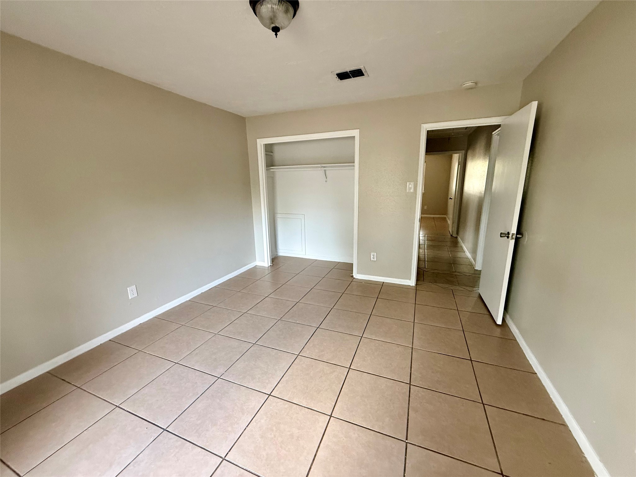 3211 Hartfield Lane Spring, TX 77388 - Photo 16 of 23 a view of a livingroom with an empty space and a window