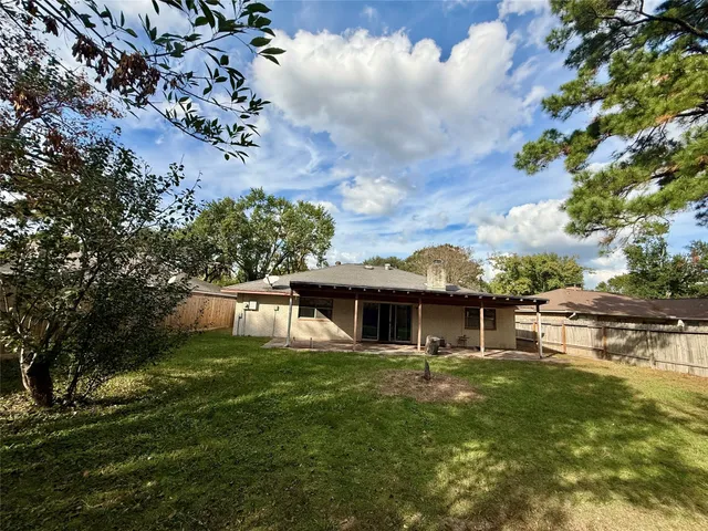 a view of a house with a big yard