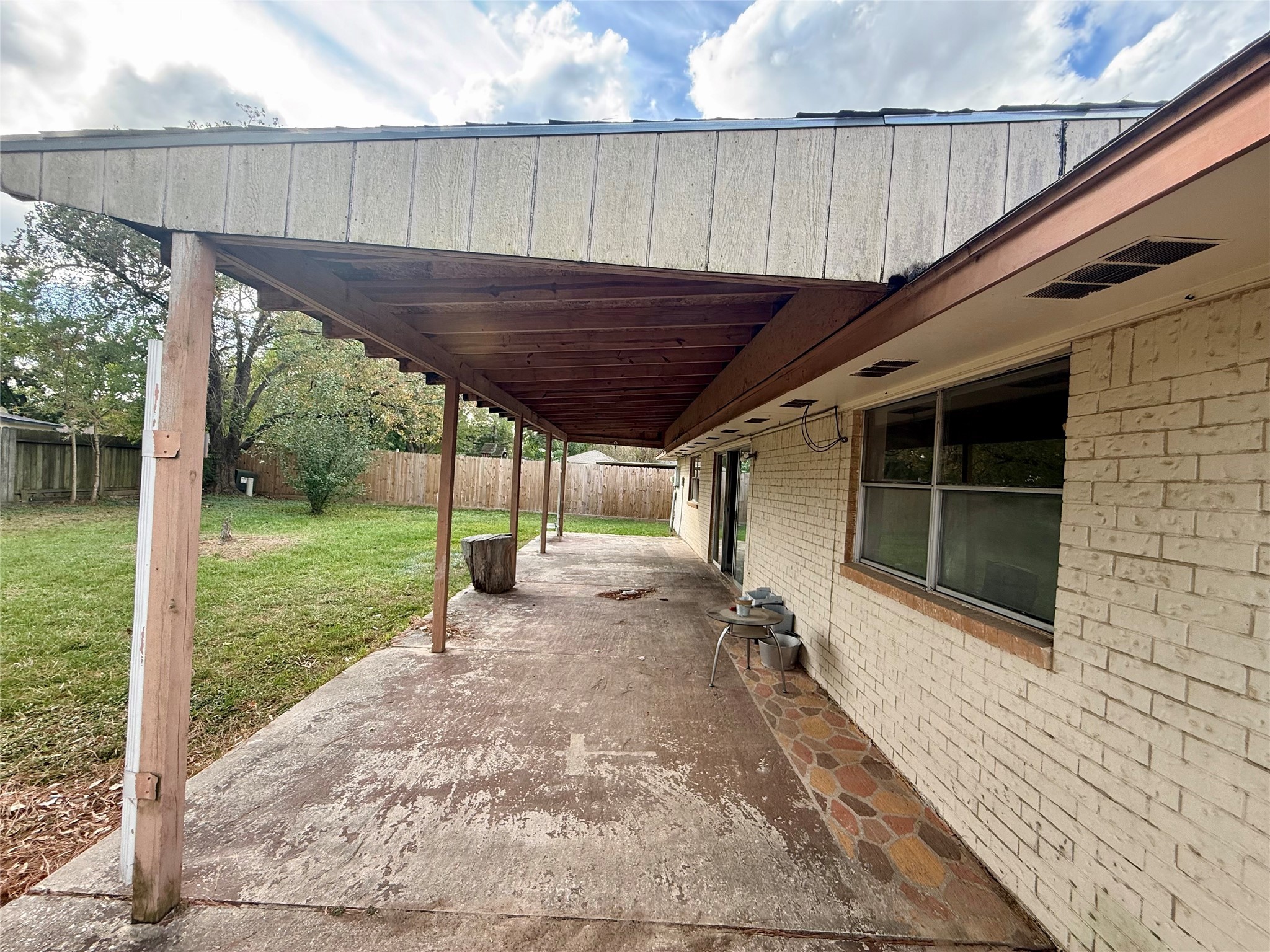3211 Hartfield Lane Spring, TX 77388 - Photo 23 of 23 a view of a backyard with a garden