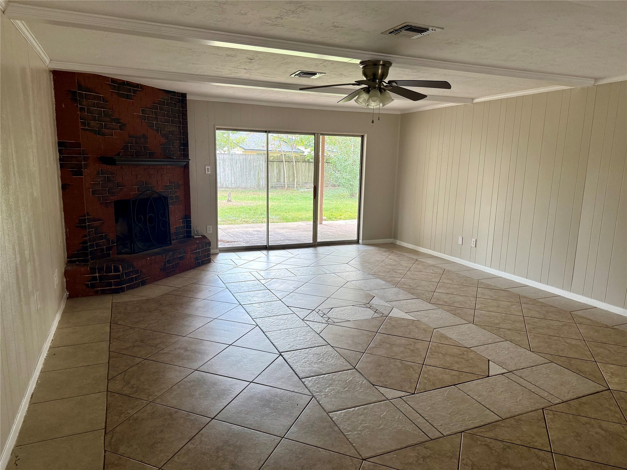 3211 Hartfield Lane Spring, TX 77388 - Photo 5 of 23 a view of a livingroom with a fireplace and a chandelier
