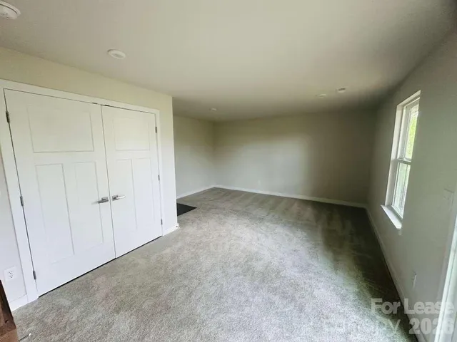an empty room with a natural light