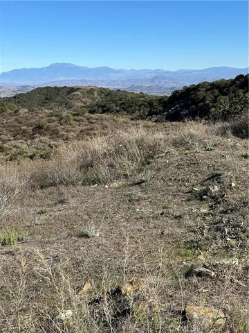 a view of lake with mountain