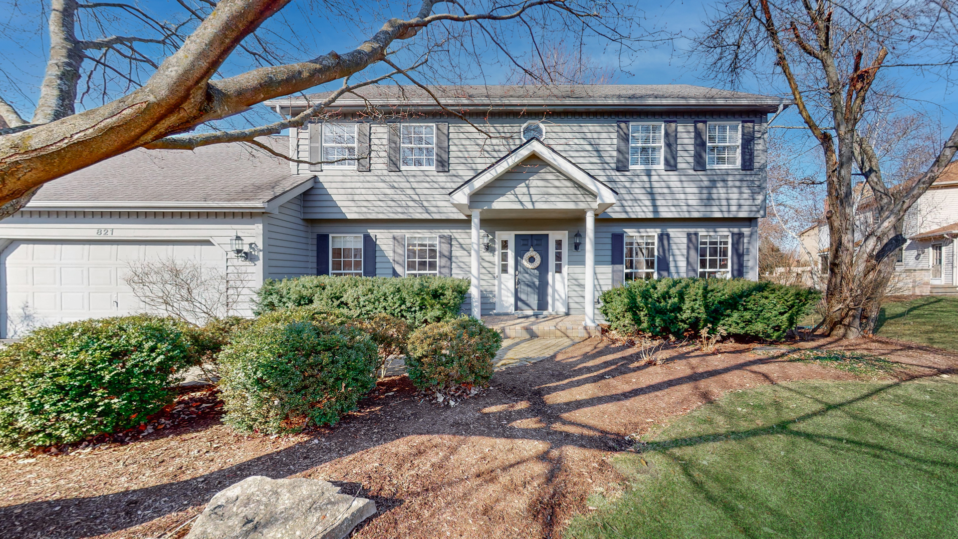 821 South River Road Naperville, IL 60540 - Photo 1 of 32 a front view of a house with a yard