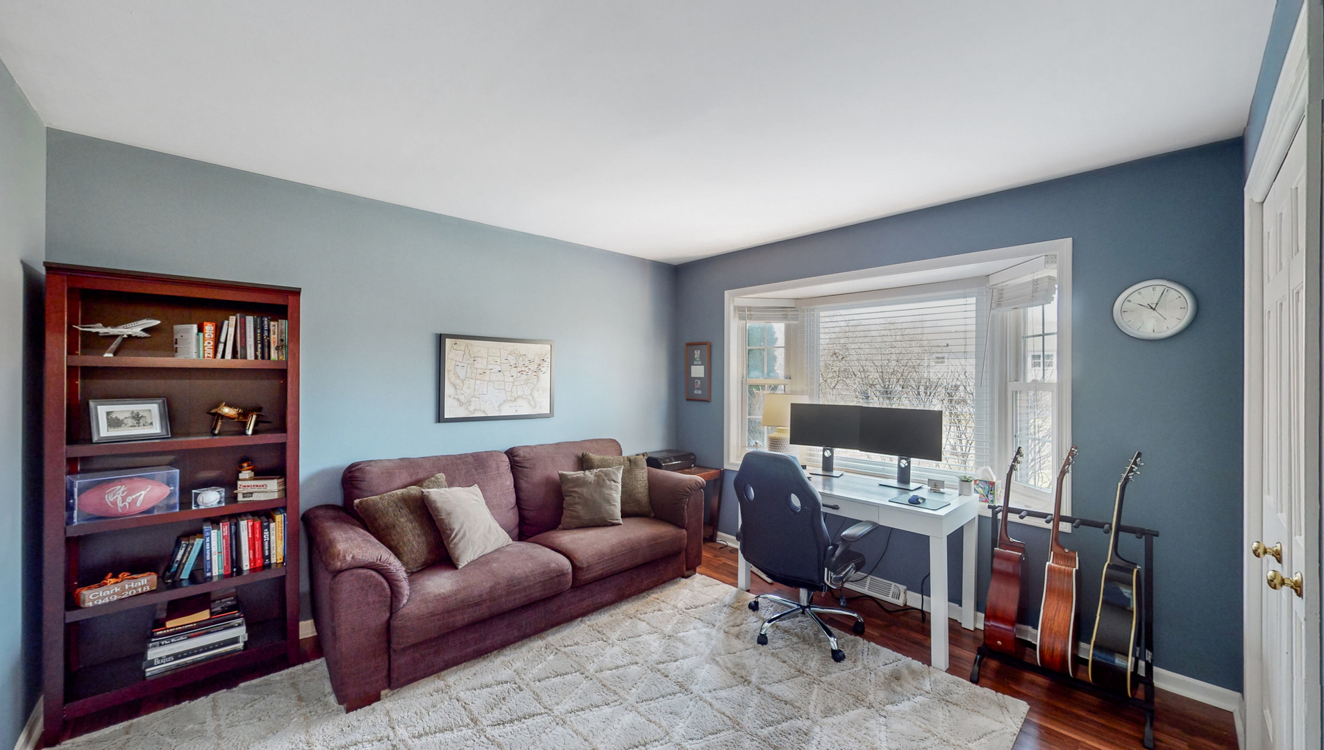 821 South River Road Naperville, IL 60540 - Photo 14 of 32 a view of a livingroom with workspace and a couch